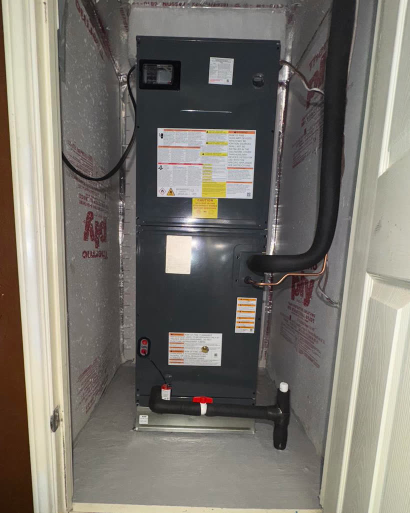 New air handler installed in the same closet, sealed and insulated